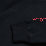 Sweat à capuche noir avec badge